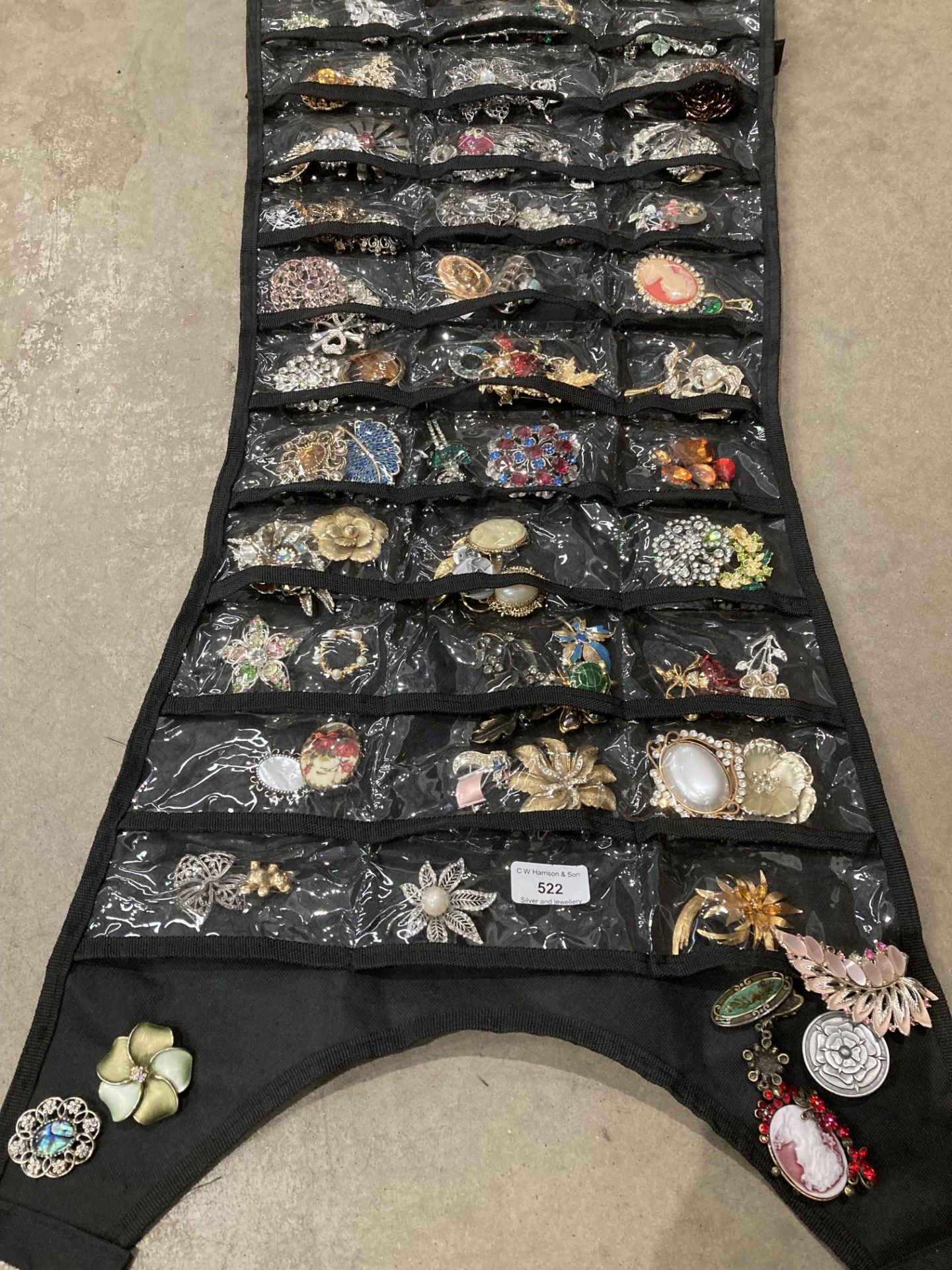 Roll up bag holder with large quantity of assorted brooches. - Image 3 of 3