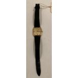 18ct (750) gold "Jean Renet" gentleman's watch with a black leather strap (missing clasp) - total