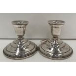 Matching pair of sterling silver candlestick holders with weighted bases, 8.