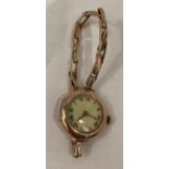 9ct gold (375) 'Limit' Swiss made ladies watch with white enamel face and a 9ct gold sprung strap -