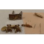 9ct gold (375) Daily News tie pin (3g), an 18ct (750) car pin badge with two small clear stones (2.
