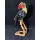 A Swarovski Paradise Birds Toucan in black diamond crystal on moulded wood stand 20.