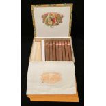 A cigar box containing eight Romeo and Julieta Habana cigars