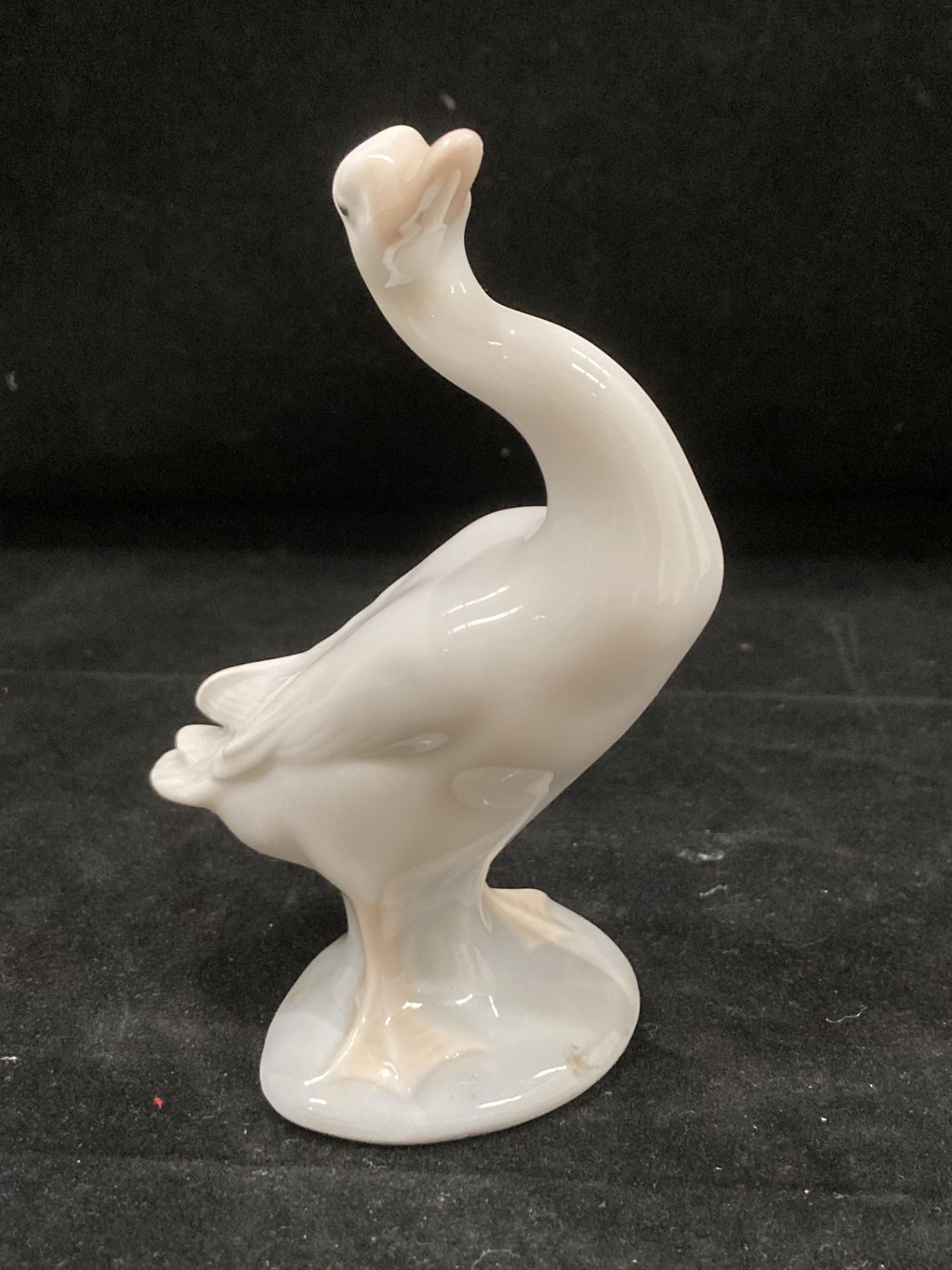 A Nao porcelain figurine of a girl feeding a goose 23cm high, - Image 6 of 7