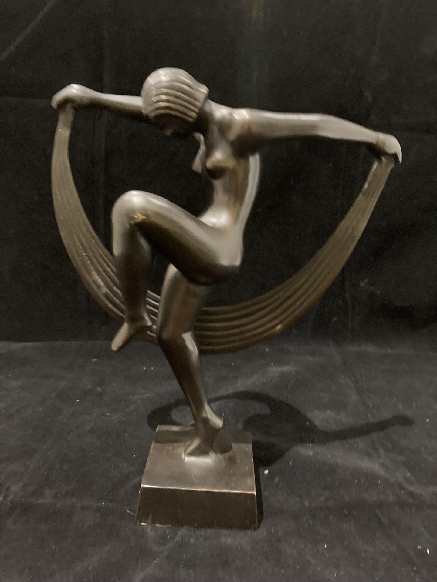 A modern Deco style metal ware naked female statue 24cm high