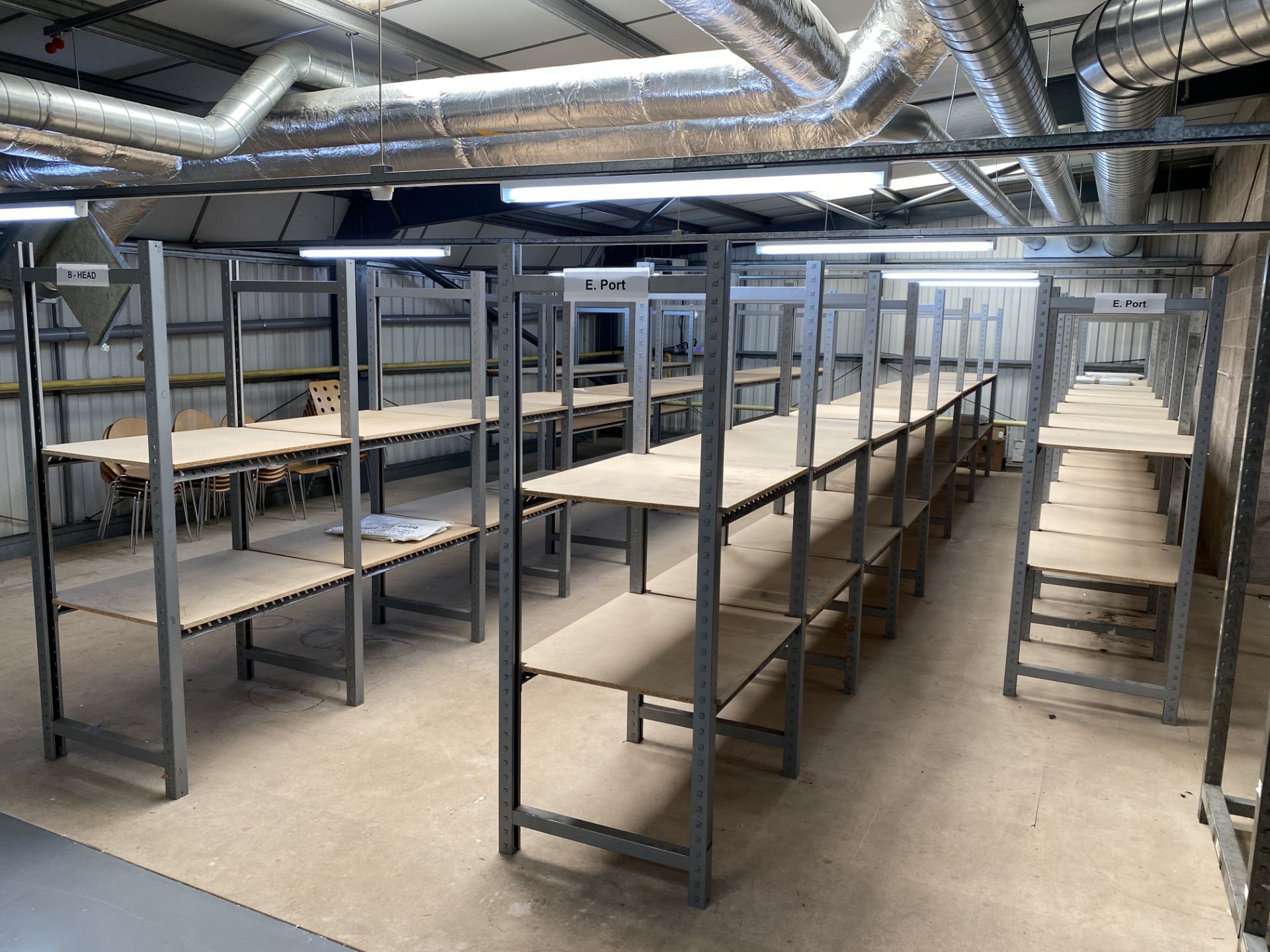 23 x Bays of Slot Together Grey Metal Parts Racking with Chipboard Shelving.