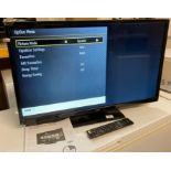 Logik 32" LED smart TV L323HE7C complete with remote (pay office)