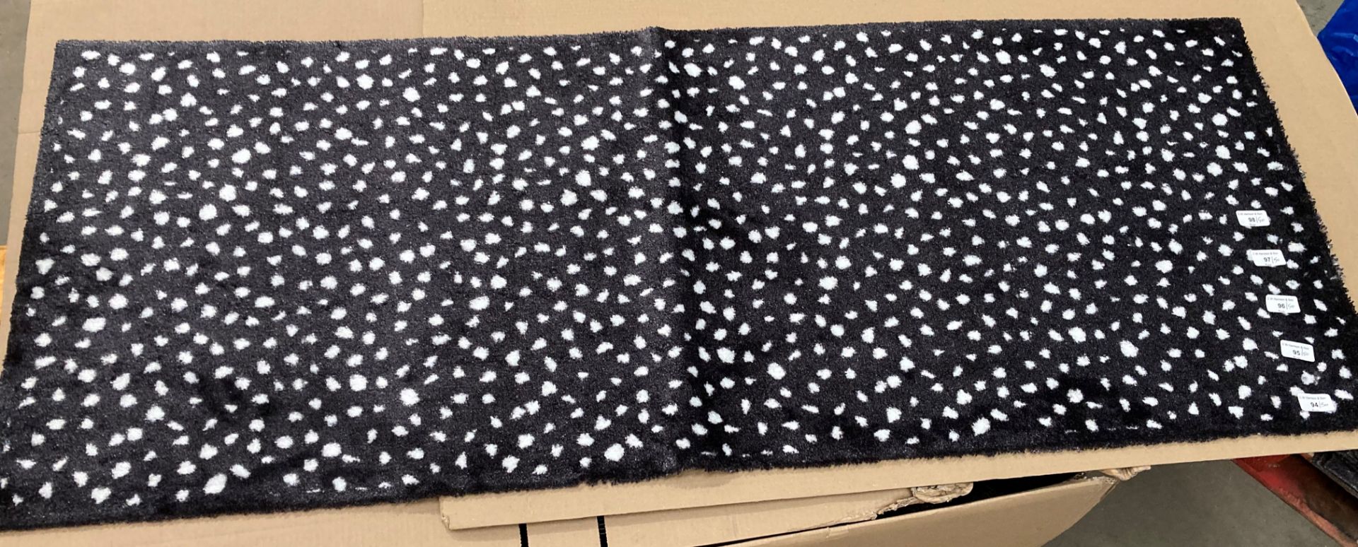 50 x grey and white polka dot mats 150cm x 60cm *Please note the final purchase price is subject