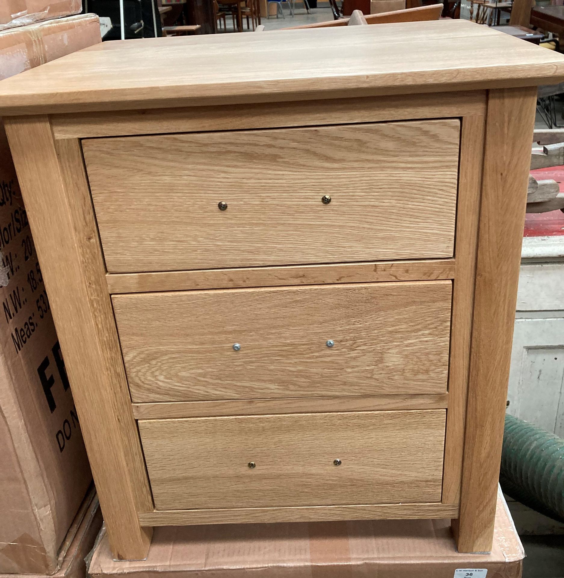 A boxed three drawer oak bedside cabinet 50cm x 40cm x 56. - Image 4 of 4