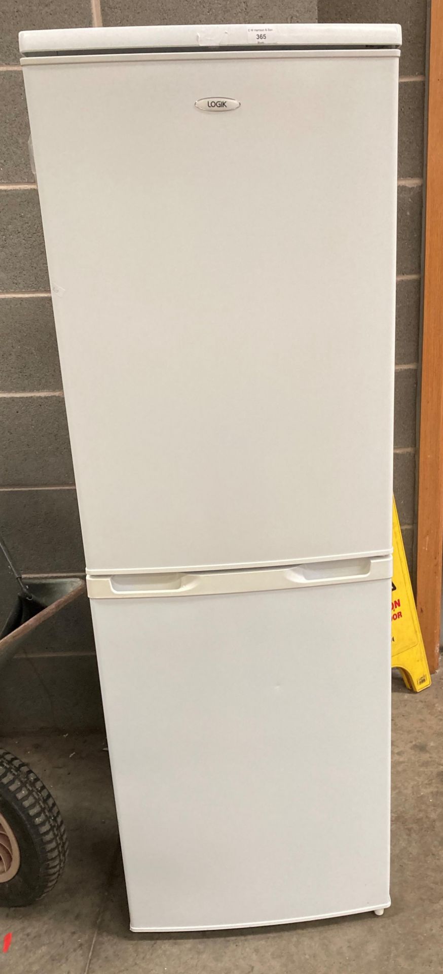 Logik upright fridge freezer (opposite pay office)