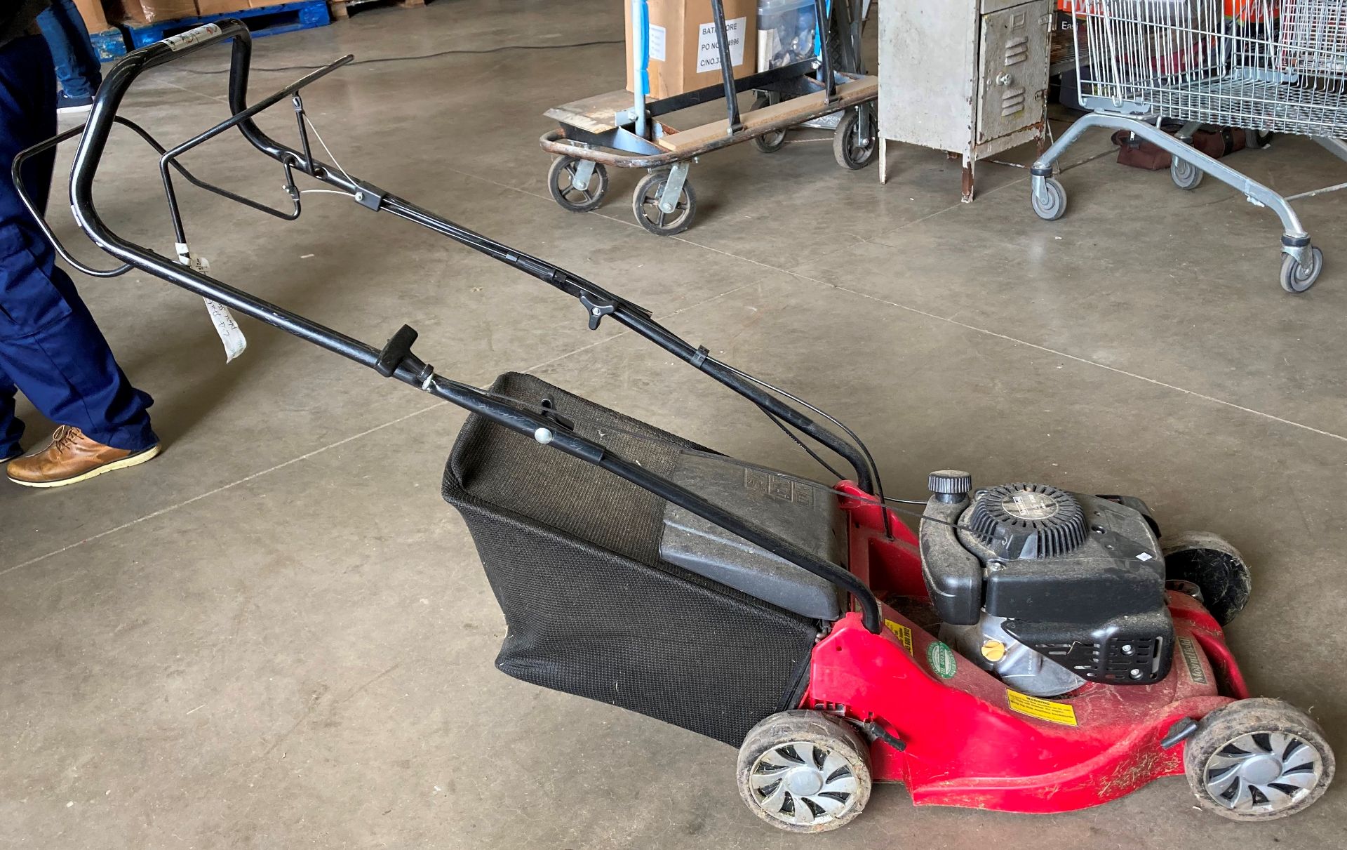 A Mountfield SP414 rotary petrol lawnmower complete with collection bucket with Mountfield RS 100cc