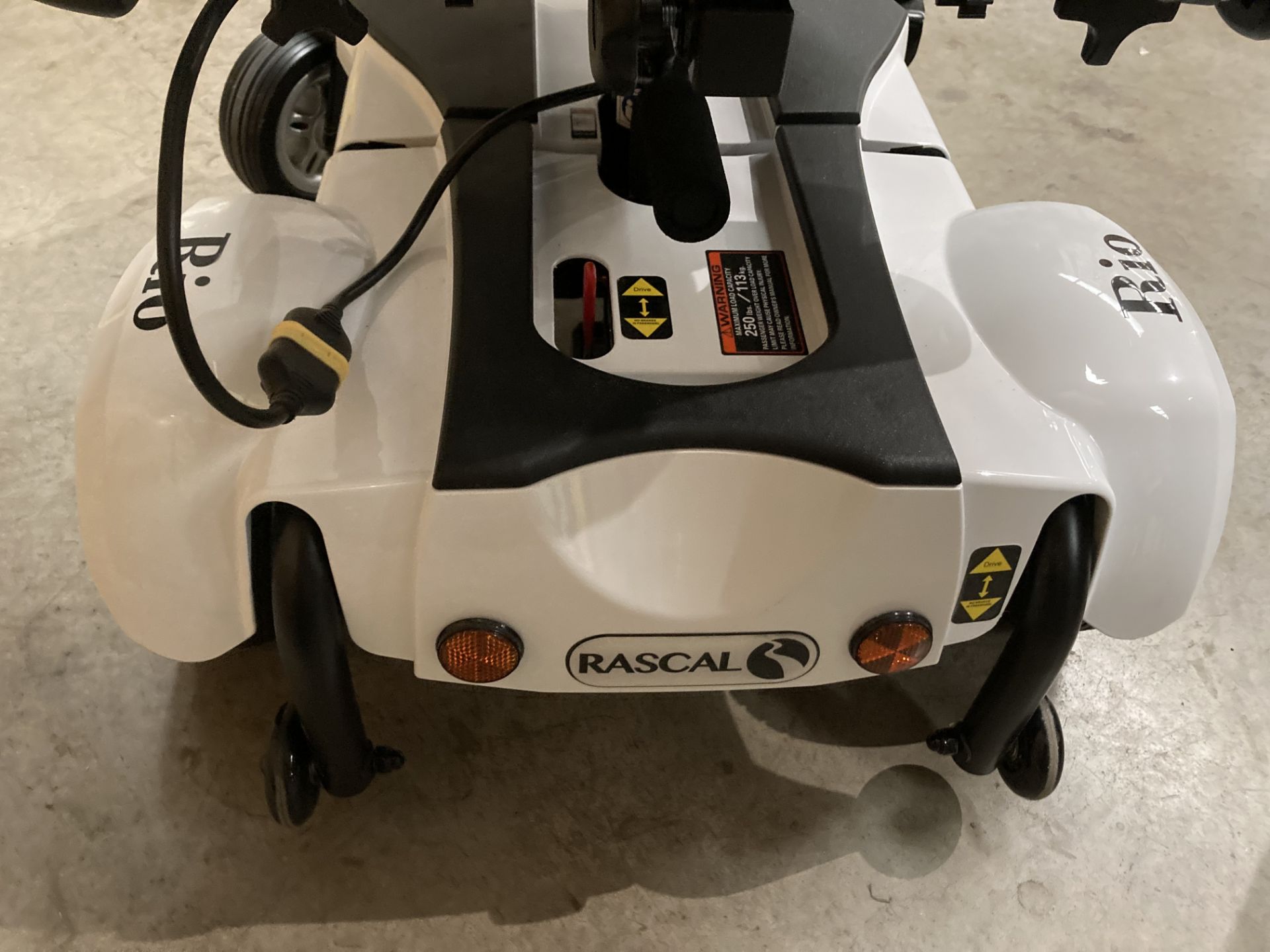 A Rio Rascal four wheel mobility scooter in white complete with charger, max. - Image 3 of 3