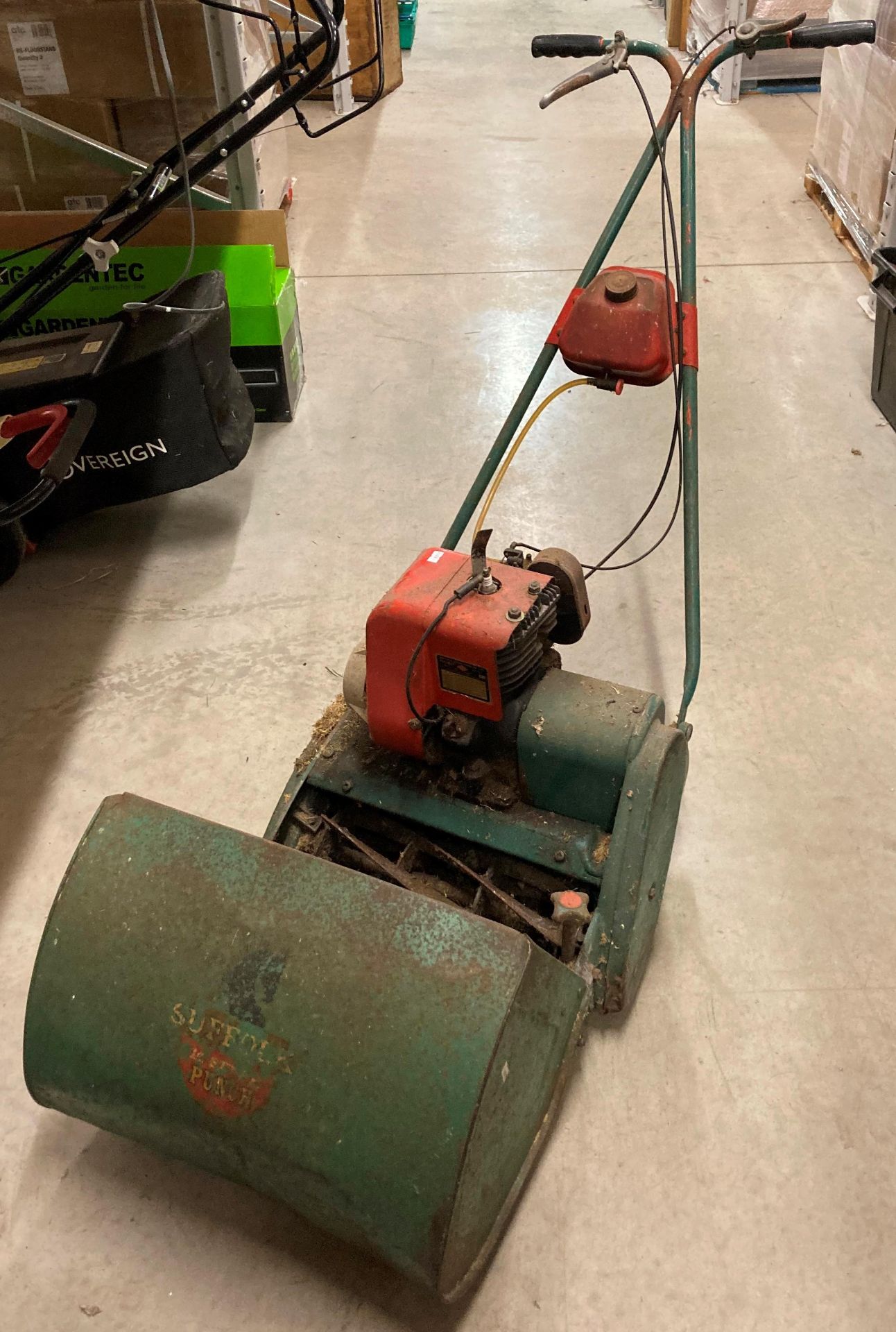 A Suffolk Lawnmower Ltd model 25A petrol cylinder lawnmower complete with collection bucket - not