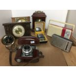 Eight items including Voigtlander Vito B camera, four clocks, Philishave HP1214,