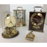 Four clocks - Timemaster Quartz Strike brass carriage clock 20cm high,