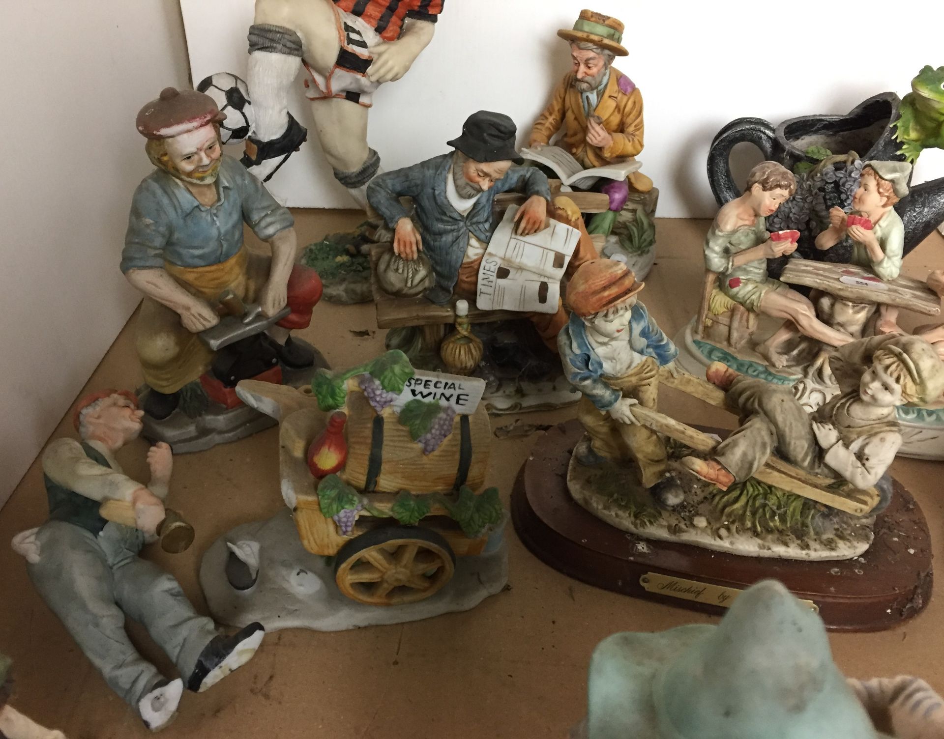 Twelve porcelain and composite figurines including Royal Doulton The Seafarer 23cm high, - Image 4 of 21