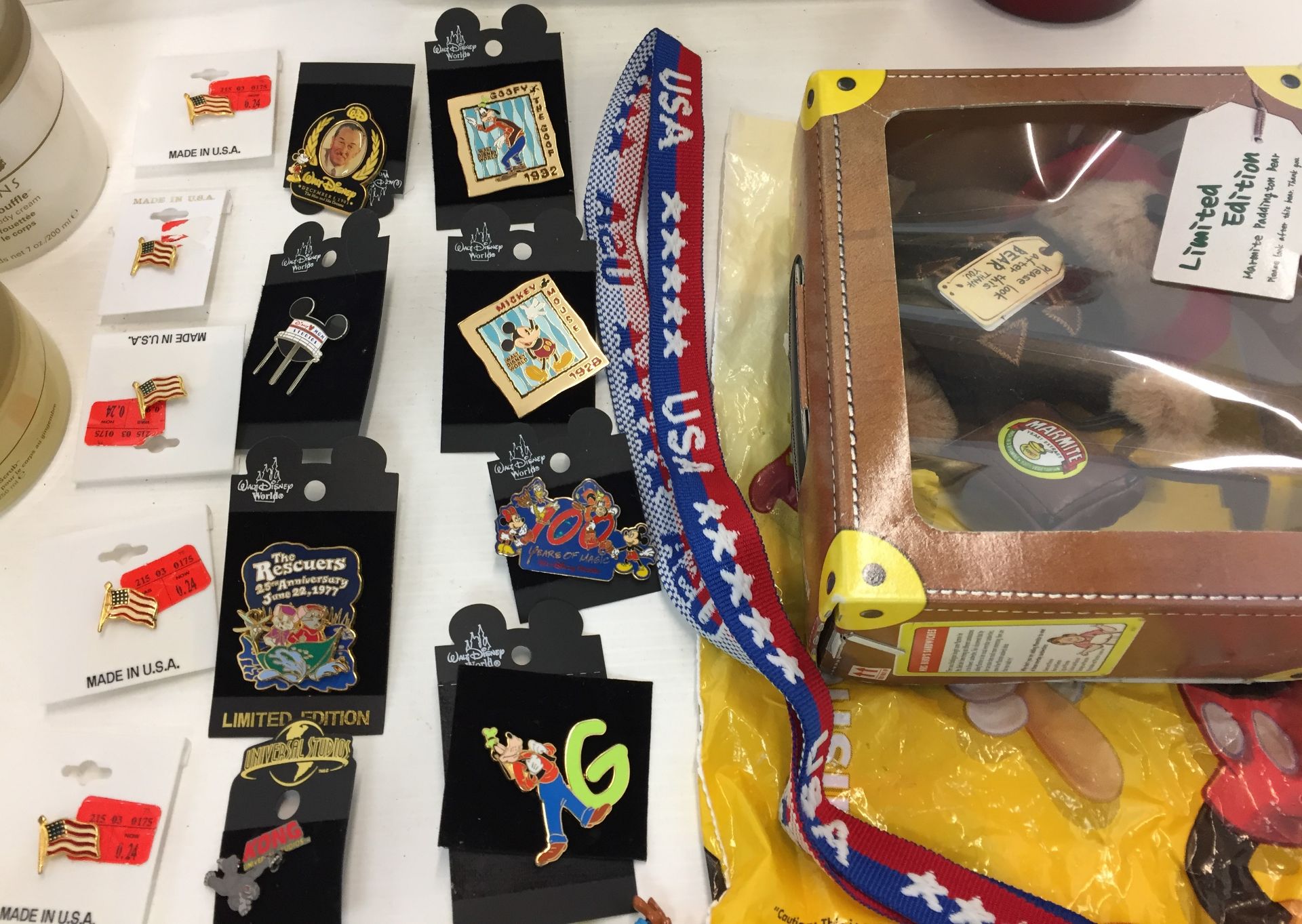 Two plastic boxes and contents including eight Walt Disney World badges, five USA flag badges, - Image 2 of 4