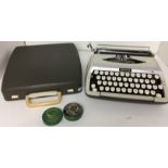 SCM Smith-Corona deluxe Zephyr portable typewriter with cover and swallow typewriter ribbon N12