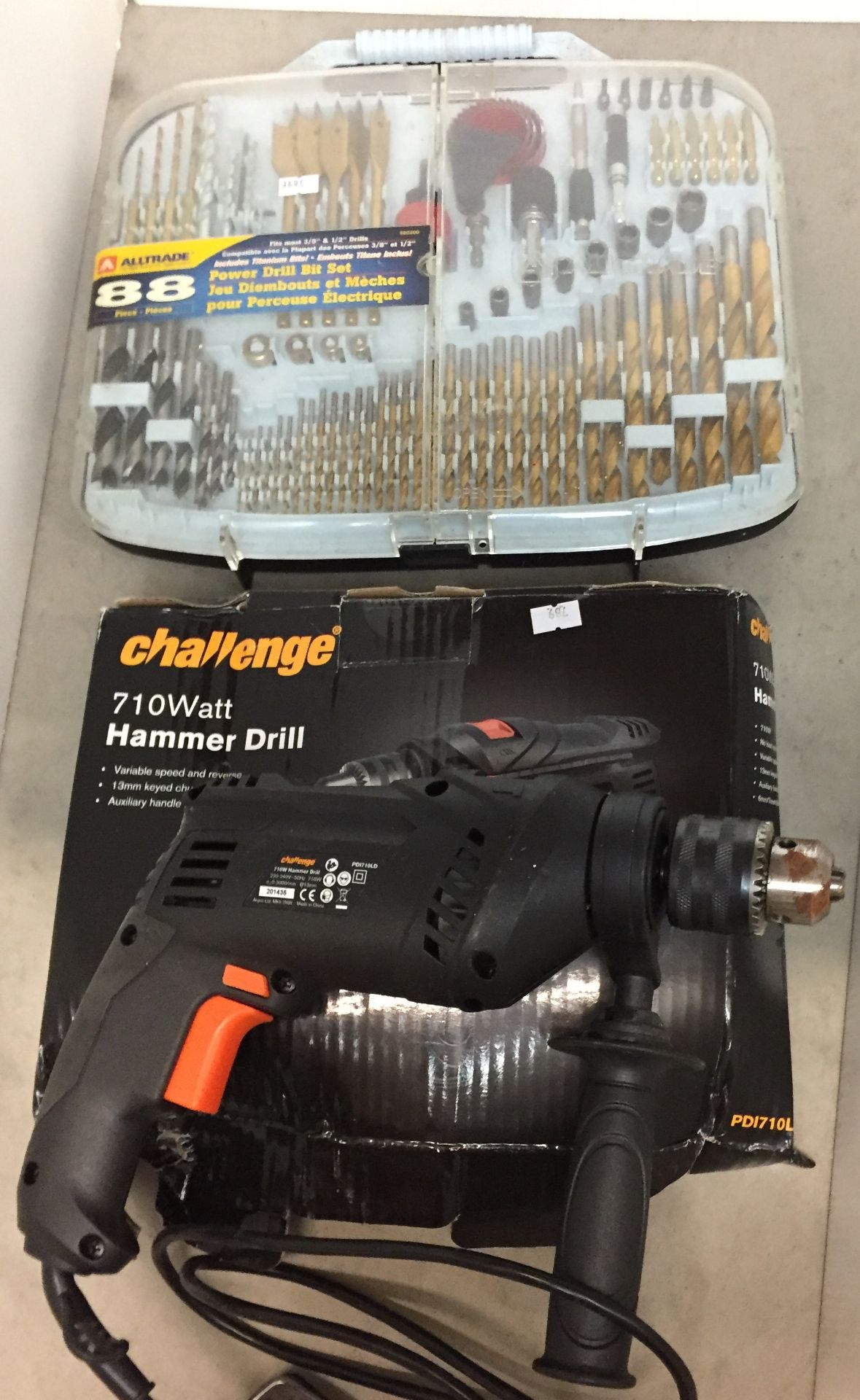 Two items - Challenge 7 10watt hammer drill with box and 88 piece power drill bit set J10