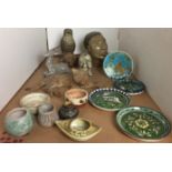 Fifteen ceramic items including study of a man's head, bird, gazelle,