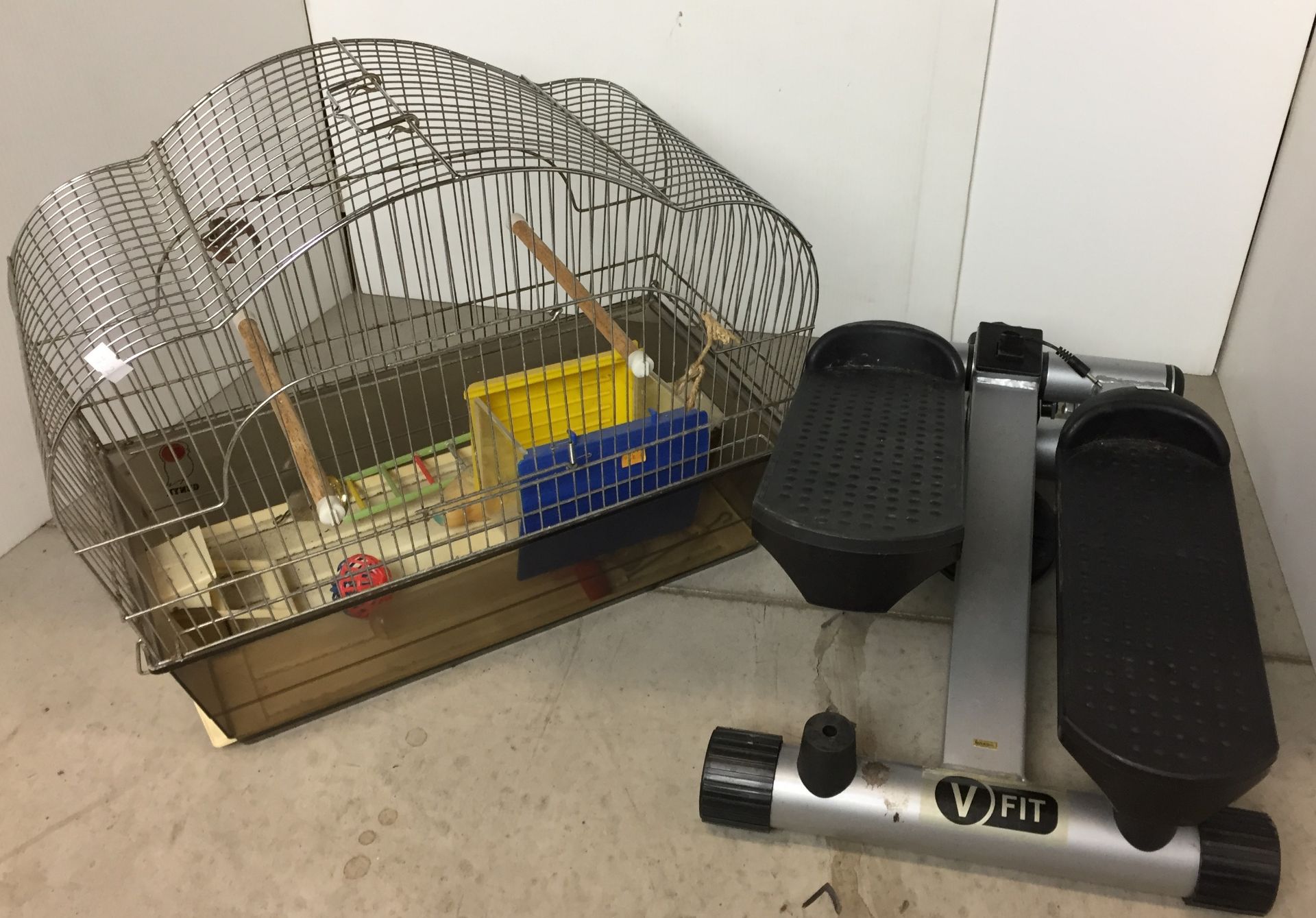 Two items - V FIT fitness stepper and bird cage 48x24x38cm high with budgie toys and accessories