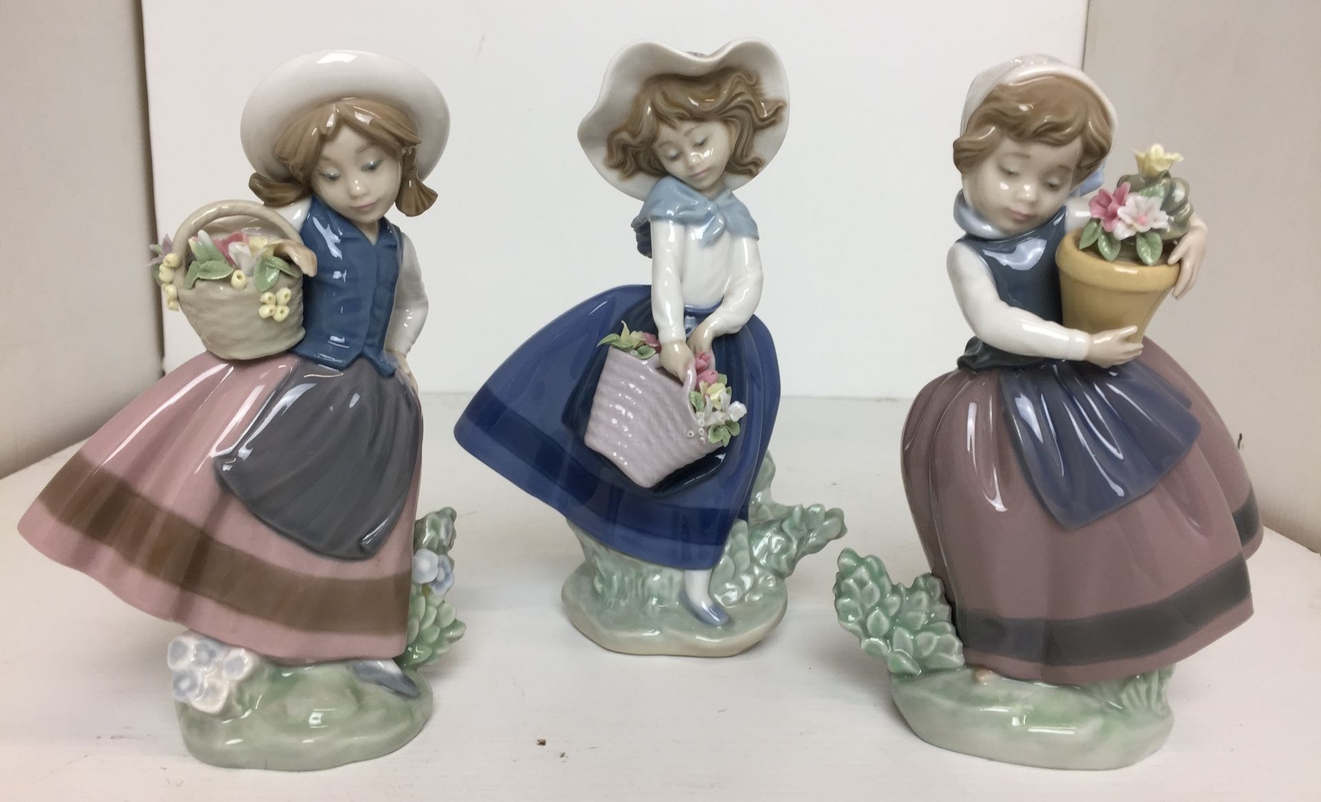 Three Lladro Flower Girl figurines max height 18cm T01