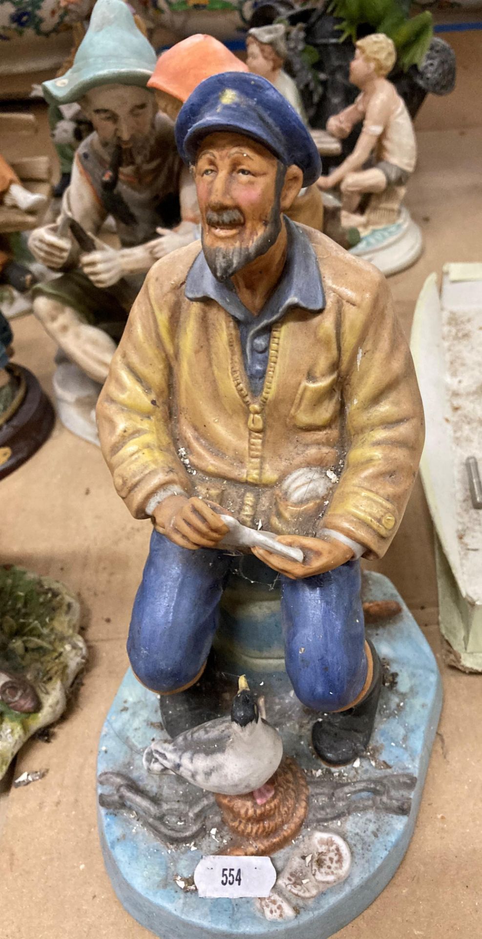 Twelve porcelain and composite figurines including Royal Doulton The Seafarer 23cm high, - Image 21 of 21