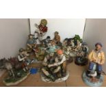 Twelve porcelain and composite figurines including Royal Doulton The Seafarer 23cm high,