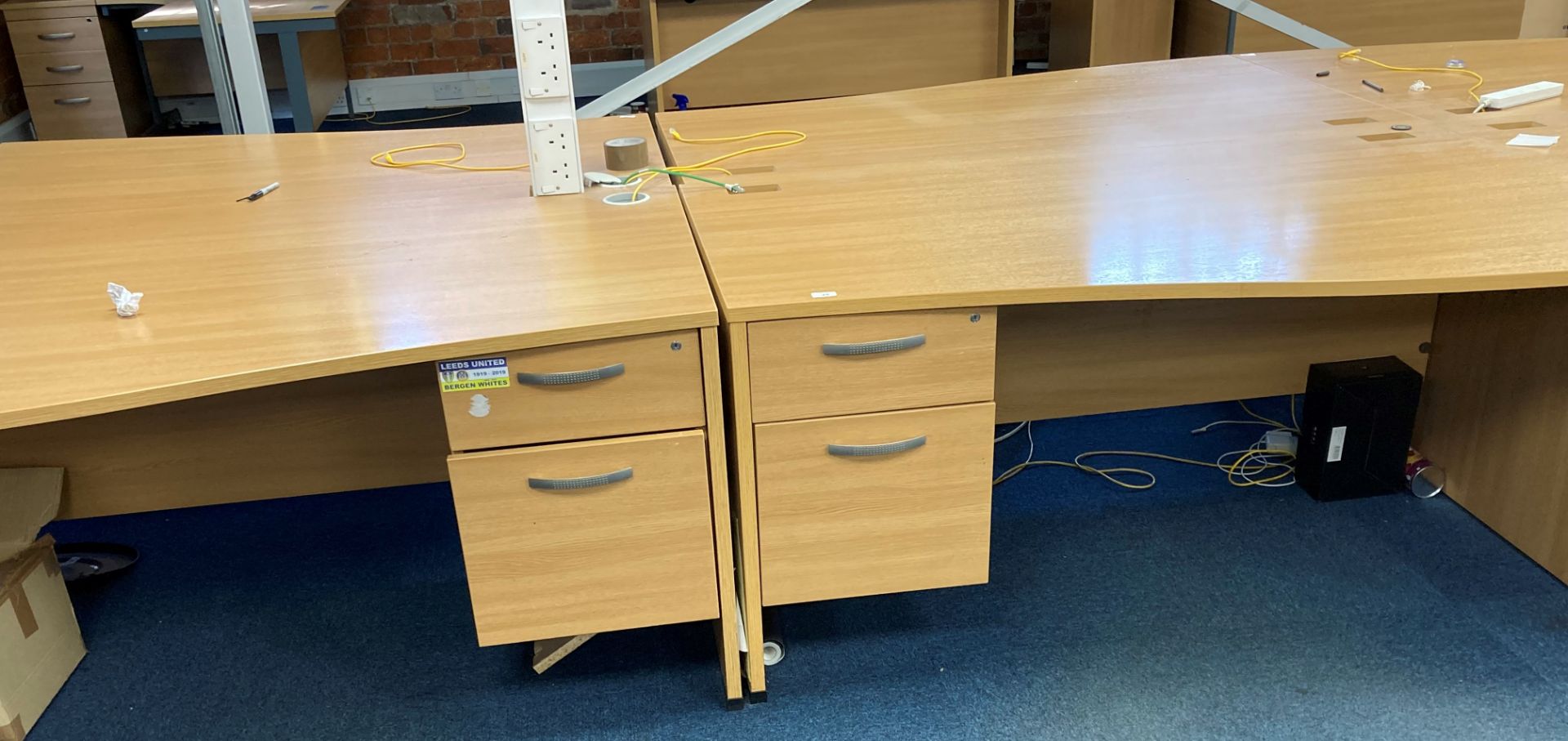 2 x curved front light oak effect 2 drawer single pedestal desks.