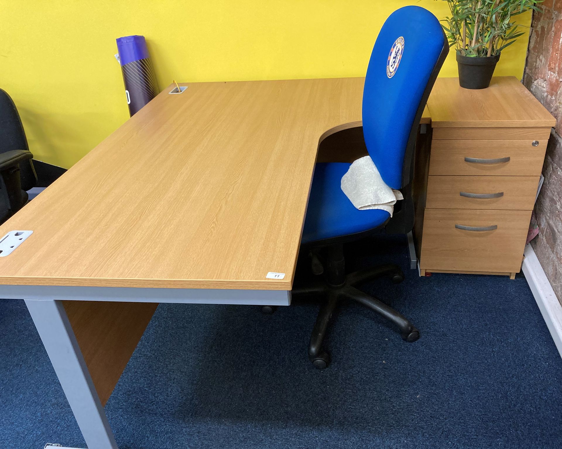 A curved front metal framed light oak effect office desk, 3 door matching pedestal,