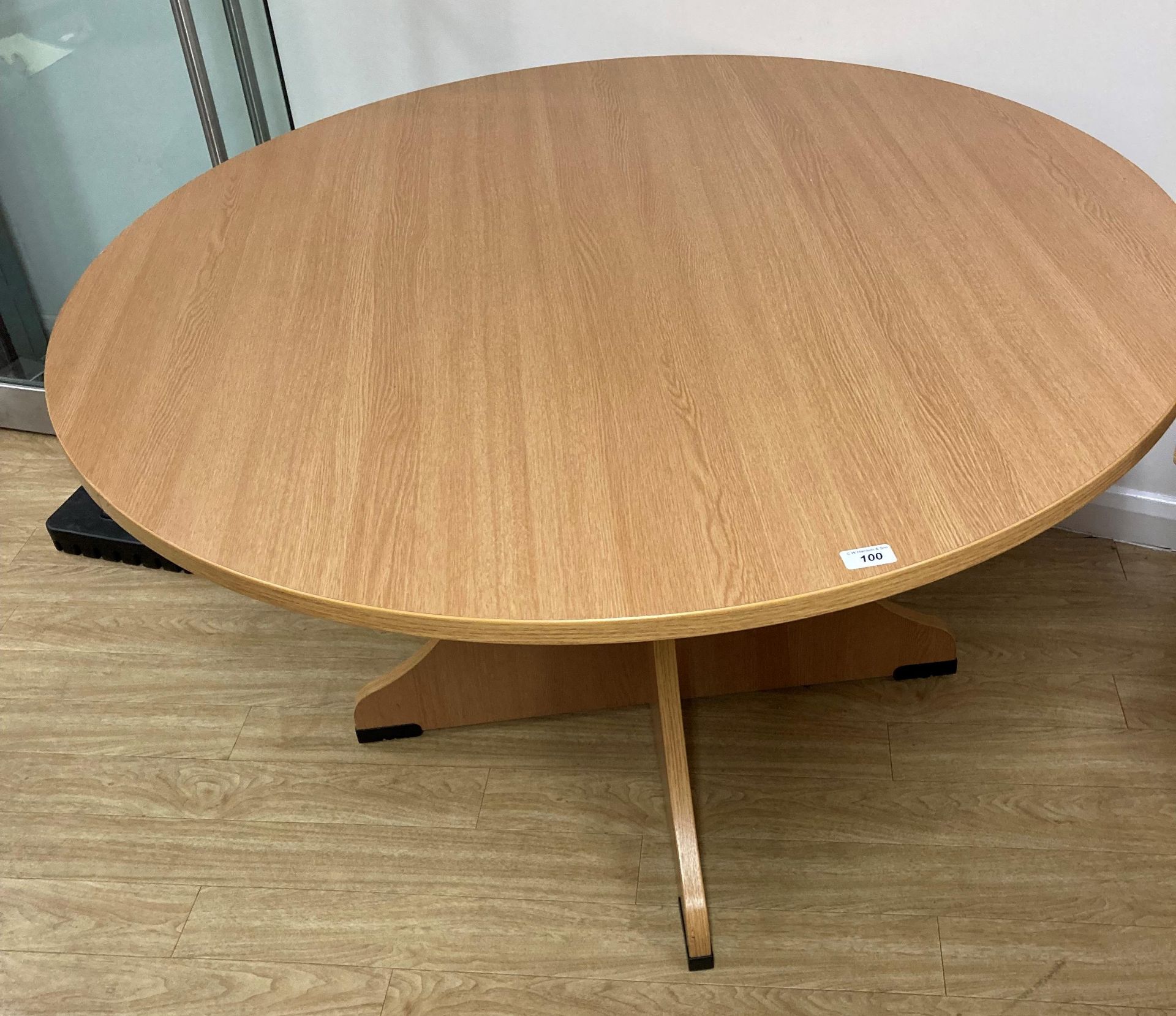 Circular light oak effect table 120cm diameter (Unit 2).