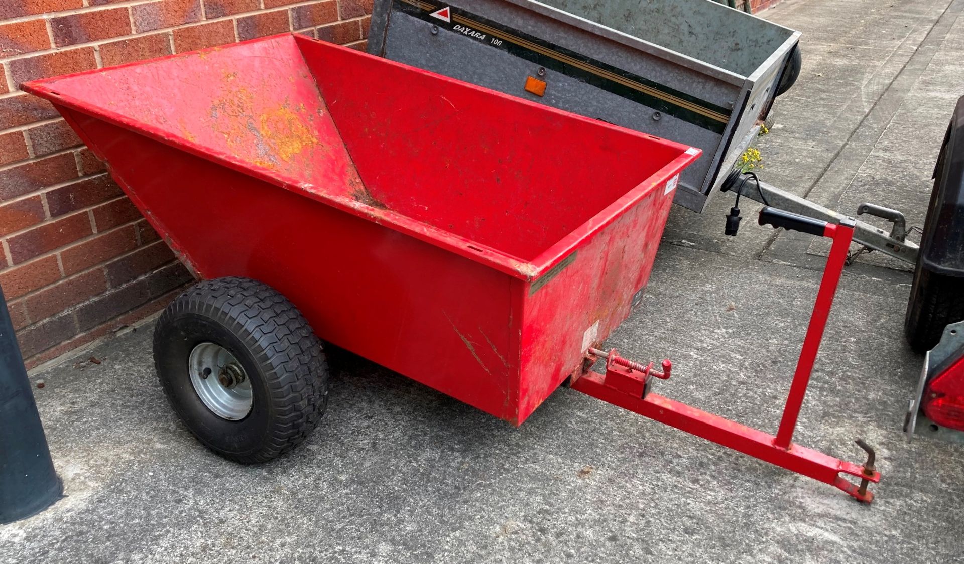 An SCH GDTT small single axle red metal tipping trailer, serial no.