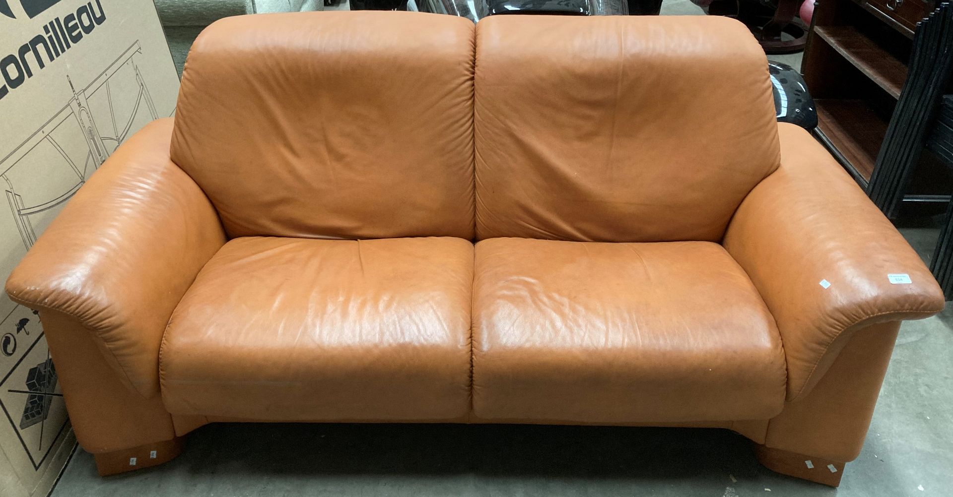 An Ekornes Stressless leather large 2 seater settee in a mustard colour with light oak feet (middle