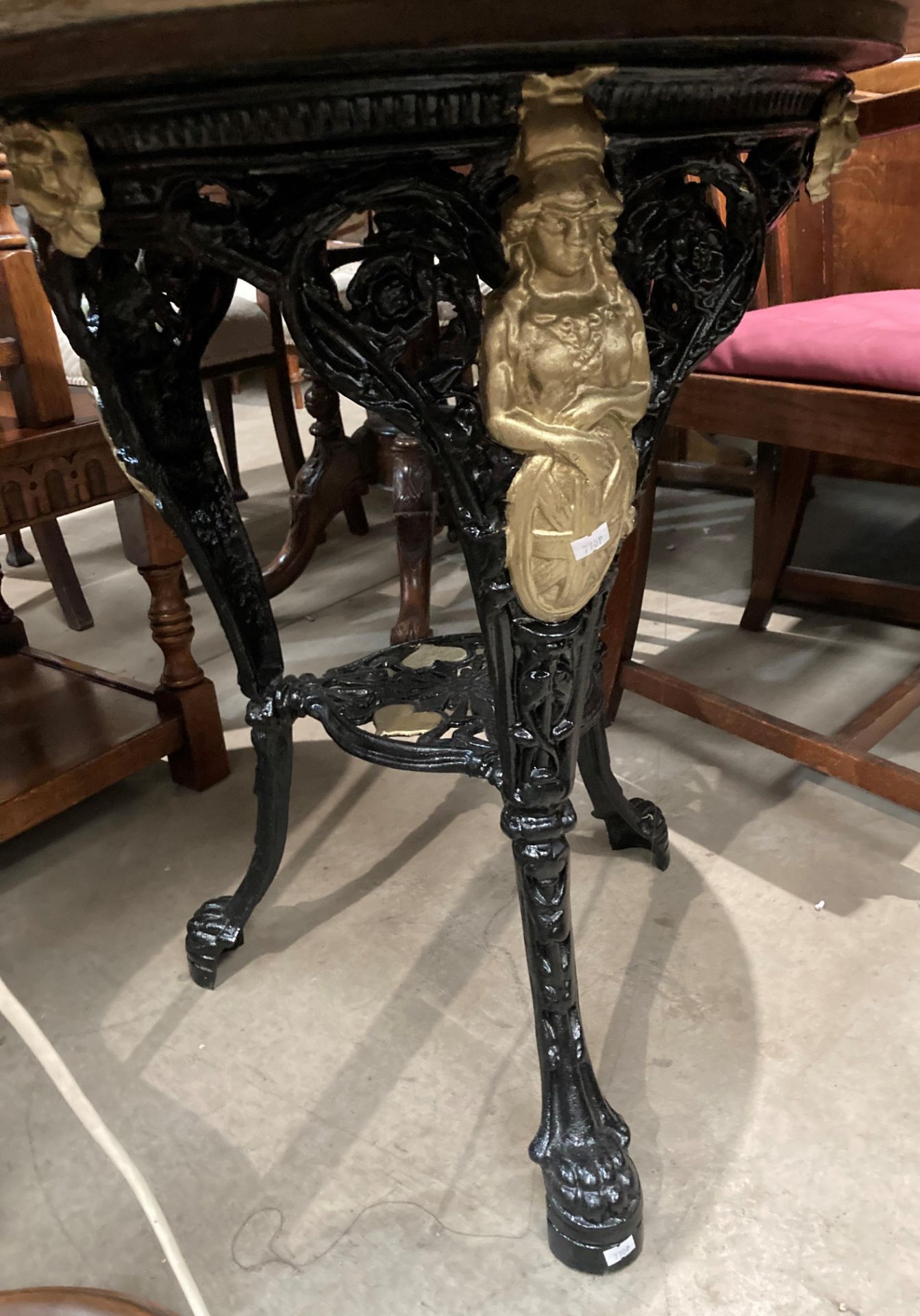 A black metal Britannia circular pub table with brown patterned marble top, - Image 2 of 4