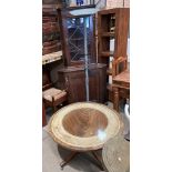 A circular mahogany single pedestal coffee table with protective glass top, 90cm diameter,