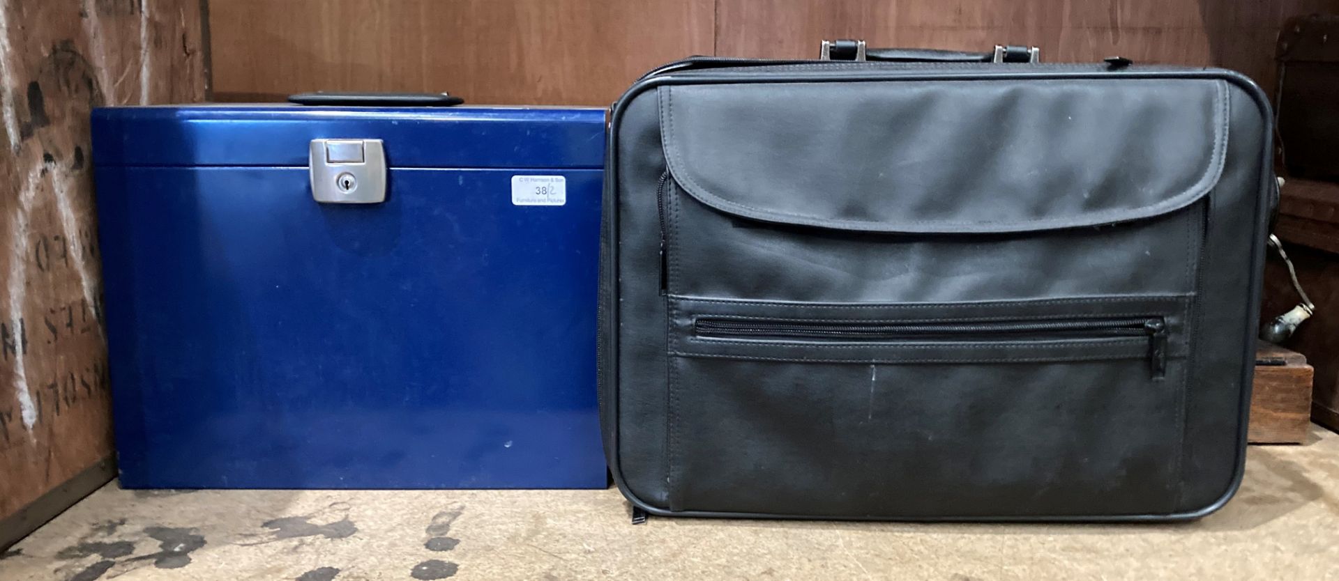 Black leather finish briefcase (no strap) and a blue metal filing box (MST)