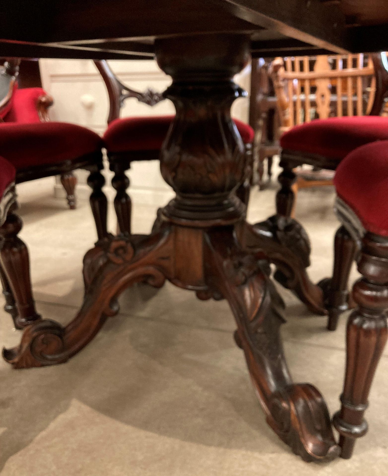 A mahogany Victorian style circular dining table on bulbous centre column support with four carved - Image 4 of 4