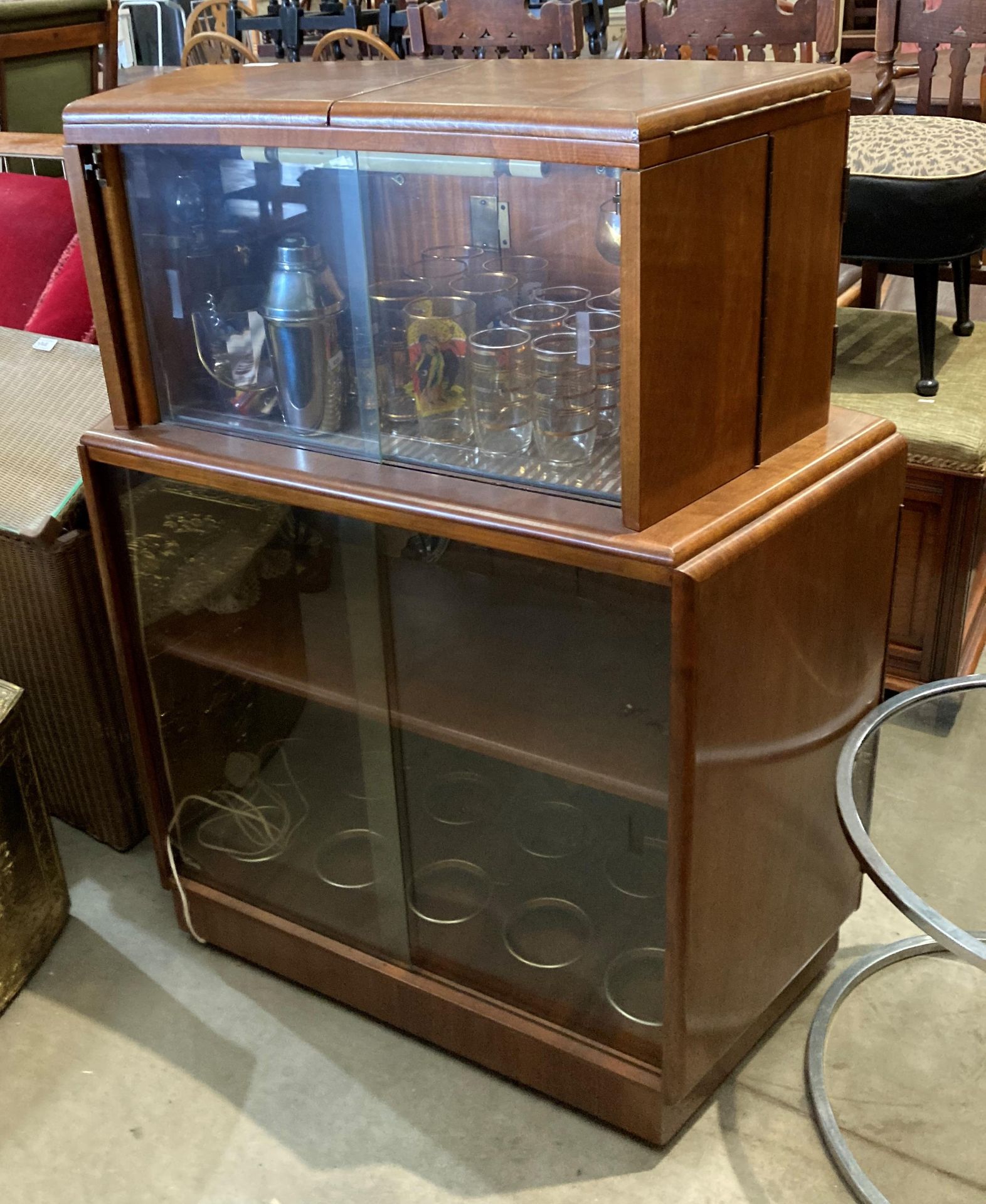 A 1950s walnut finish curved double sided bar with marble effect folding top over two doors and - Image 6 of 7