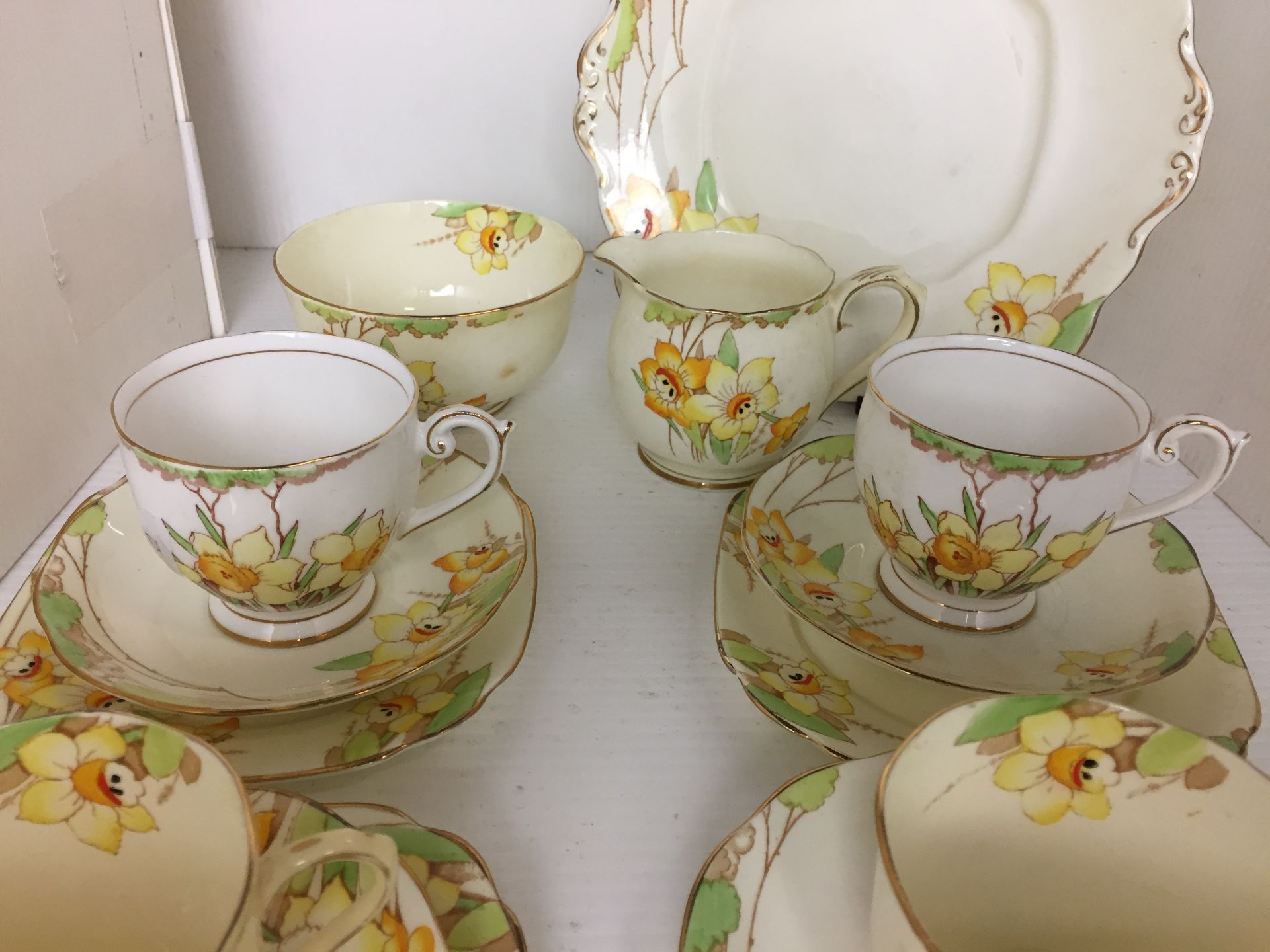 Twenty one pieces including nineteen Royal Albert Daffodil tea set (one cup cracked) and two white - Image 2 of 3