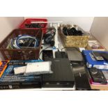 Contents to part of shelf including Creative sound blaster, Liteon DVD player, battery tester,