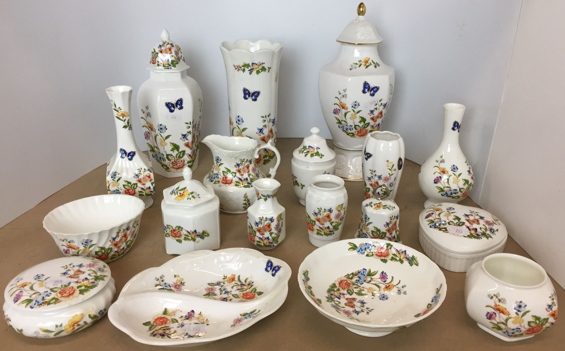 Eighteen pieces Aynsley Cottage garden including lidded urns 29 and 24cm high,