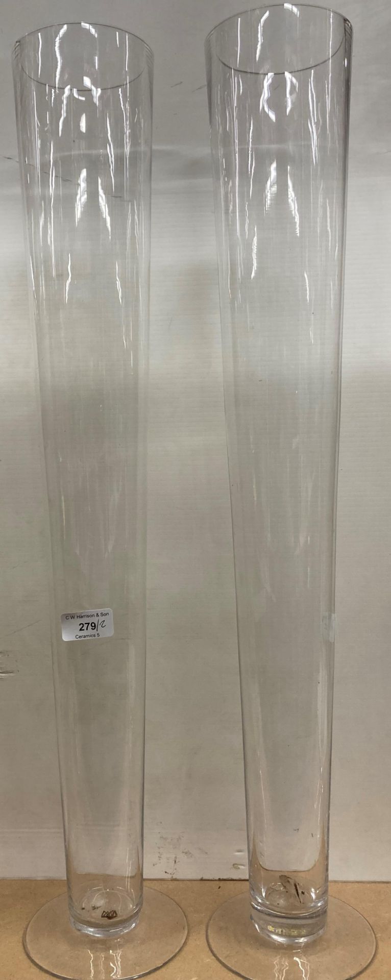 Two large glass vases 68cm