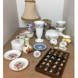 Fifteen items including 24 assorted China thimbles in wooden stand,