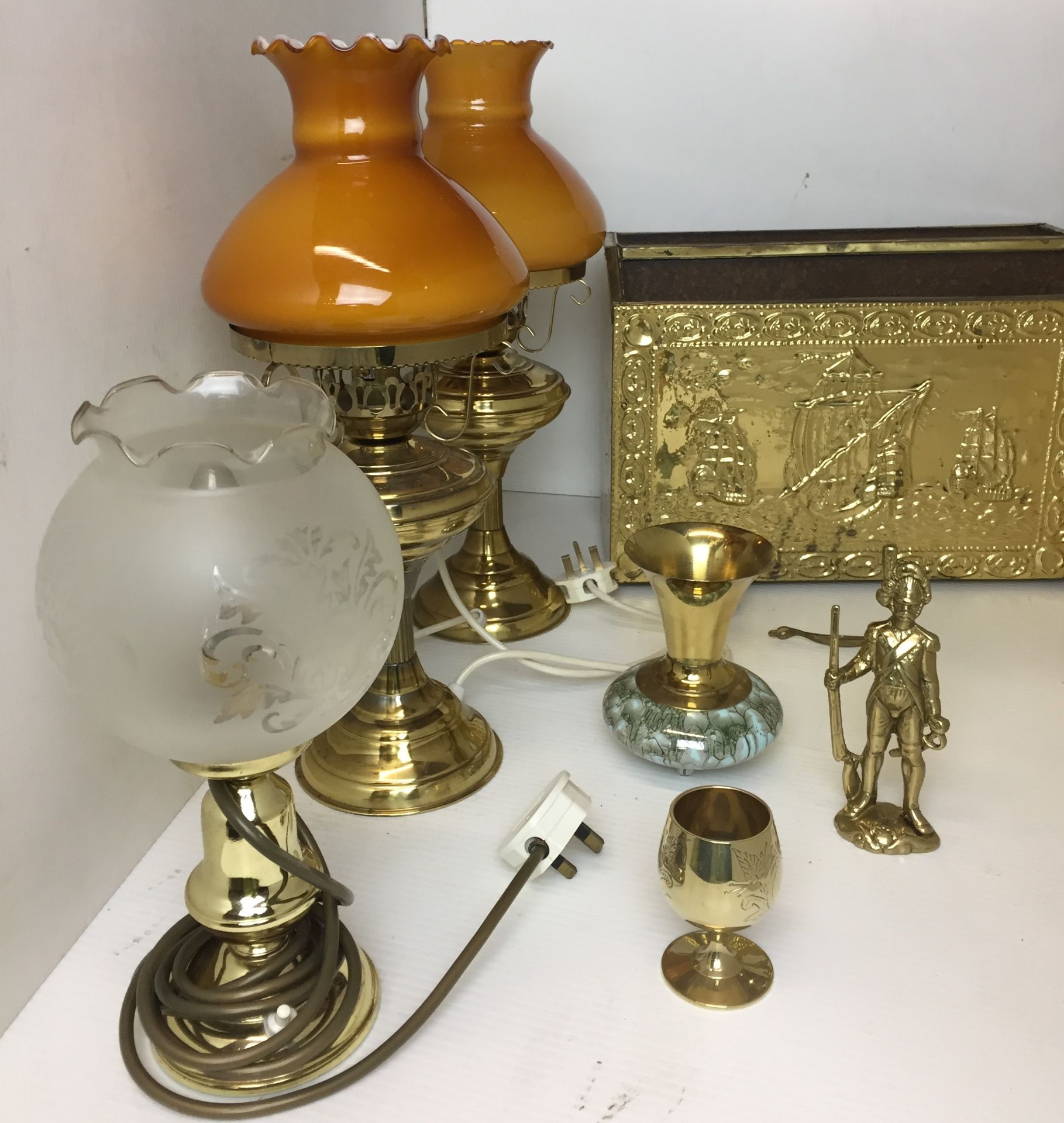 Seven items brassware including pair reproduction electric oil lamps 42cm high, magazine rack,