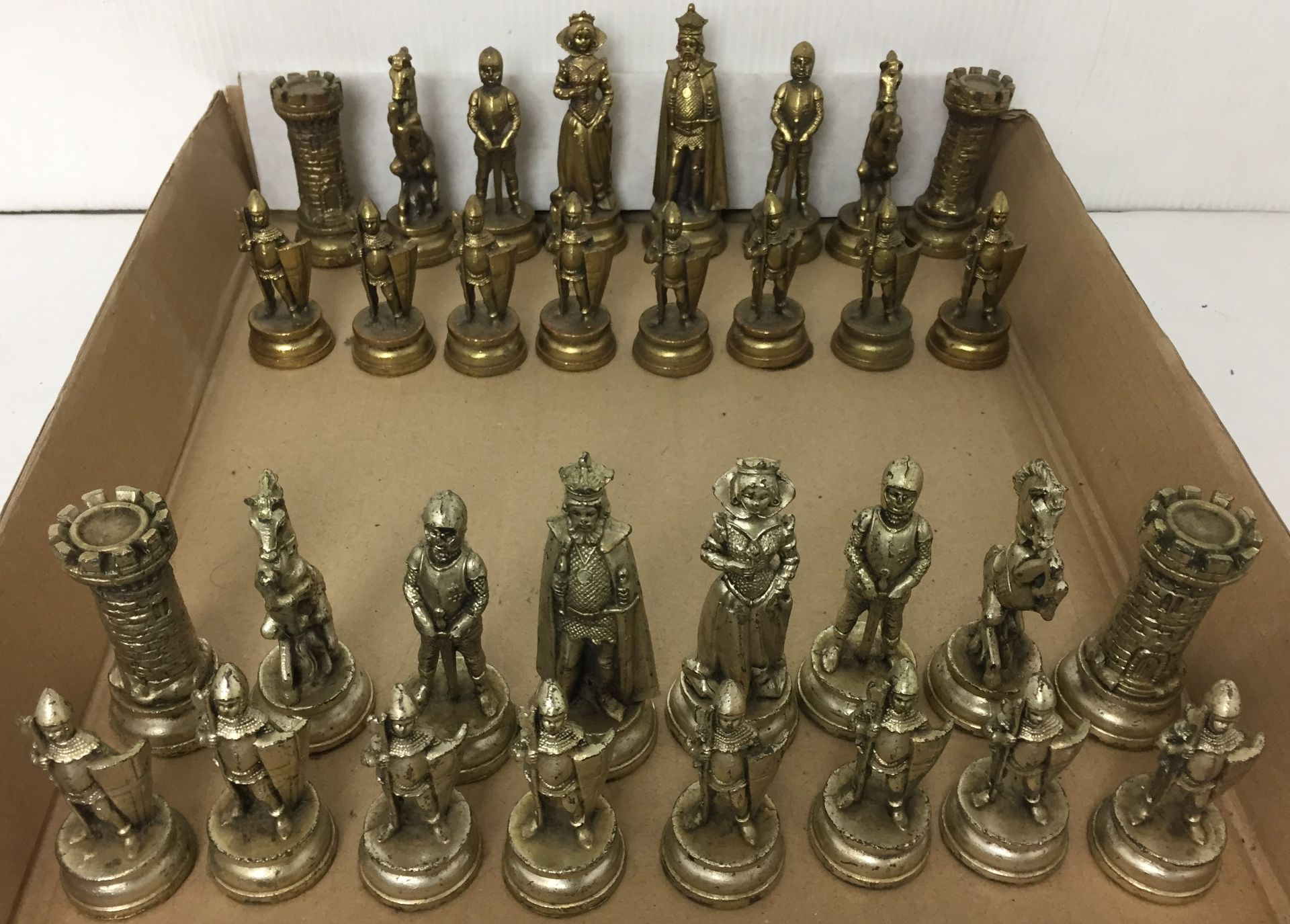 Thirty two piece solid brass chess set - the king is 10cm high S03