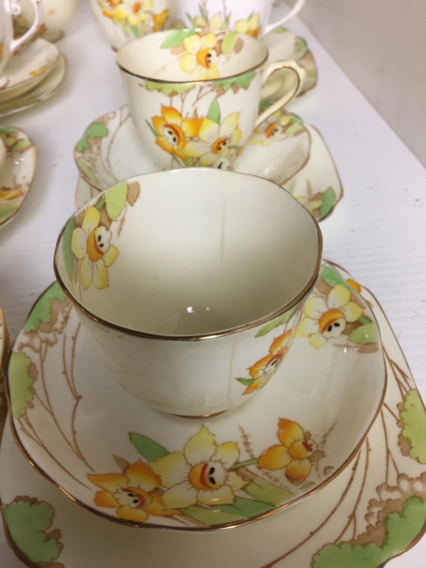 Twenty one pieces including nineteen Royal Albert Daffodil tea set (one cup cracked) and two white - Image 3 of 3