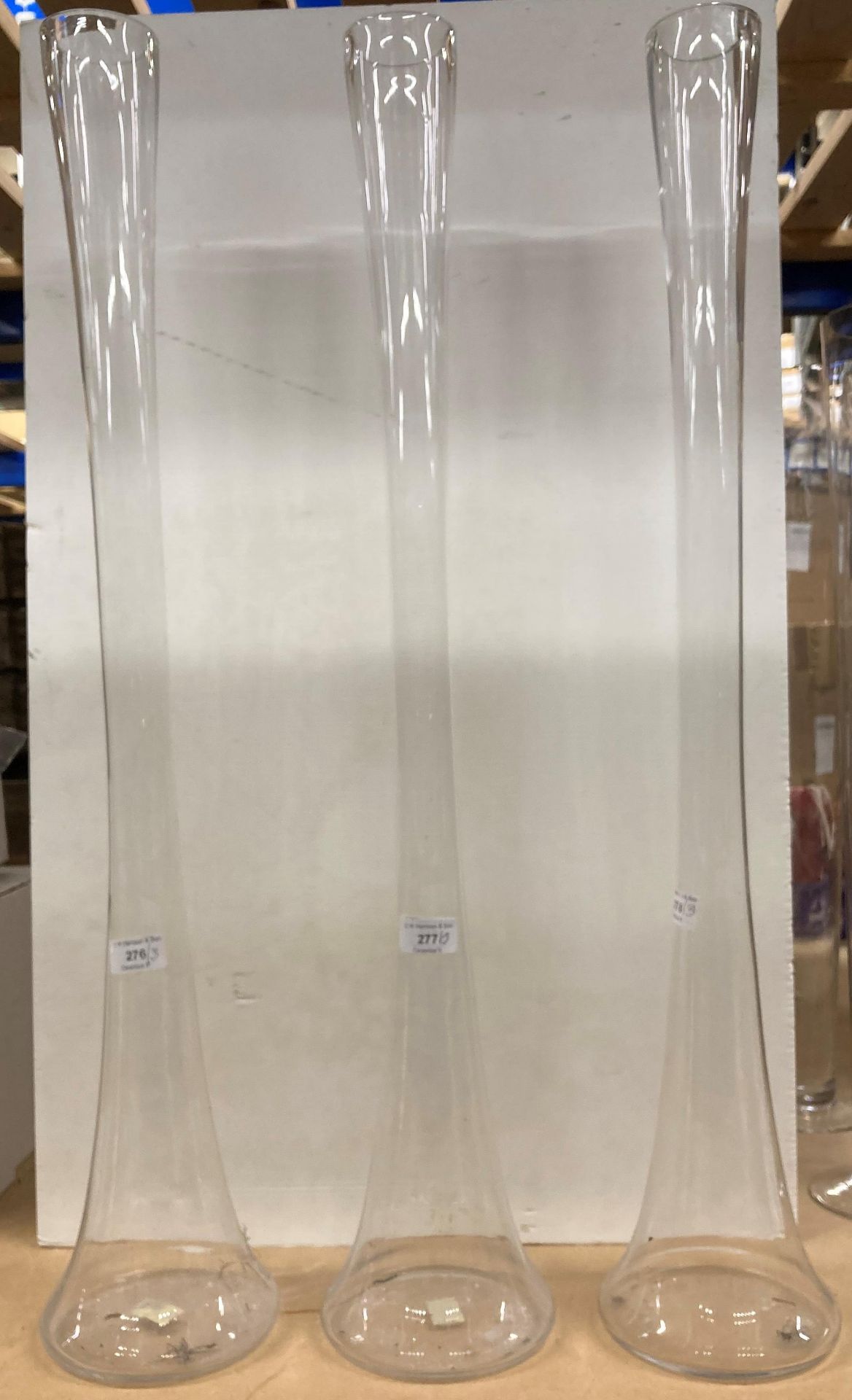 Three large glass vases 80cm