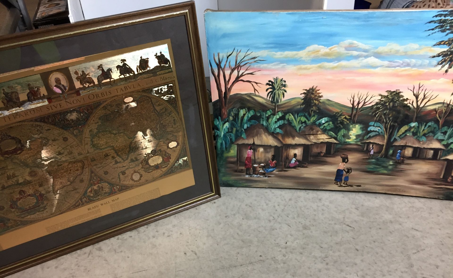 Two pictures - unframed oil painting African village scene (signature indistinct) and framed Blaeu