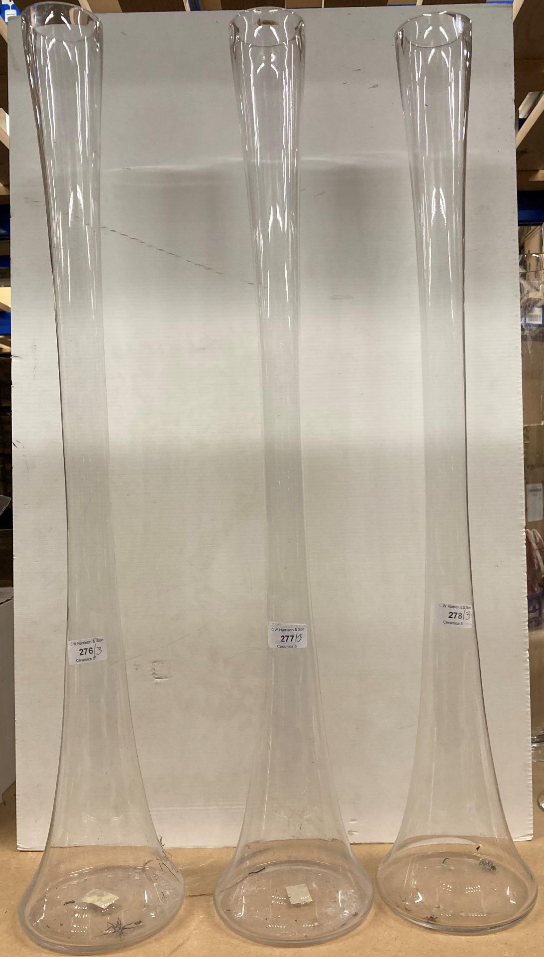 Three large glass vases 80cm