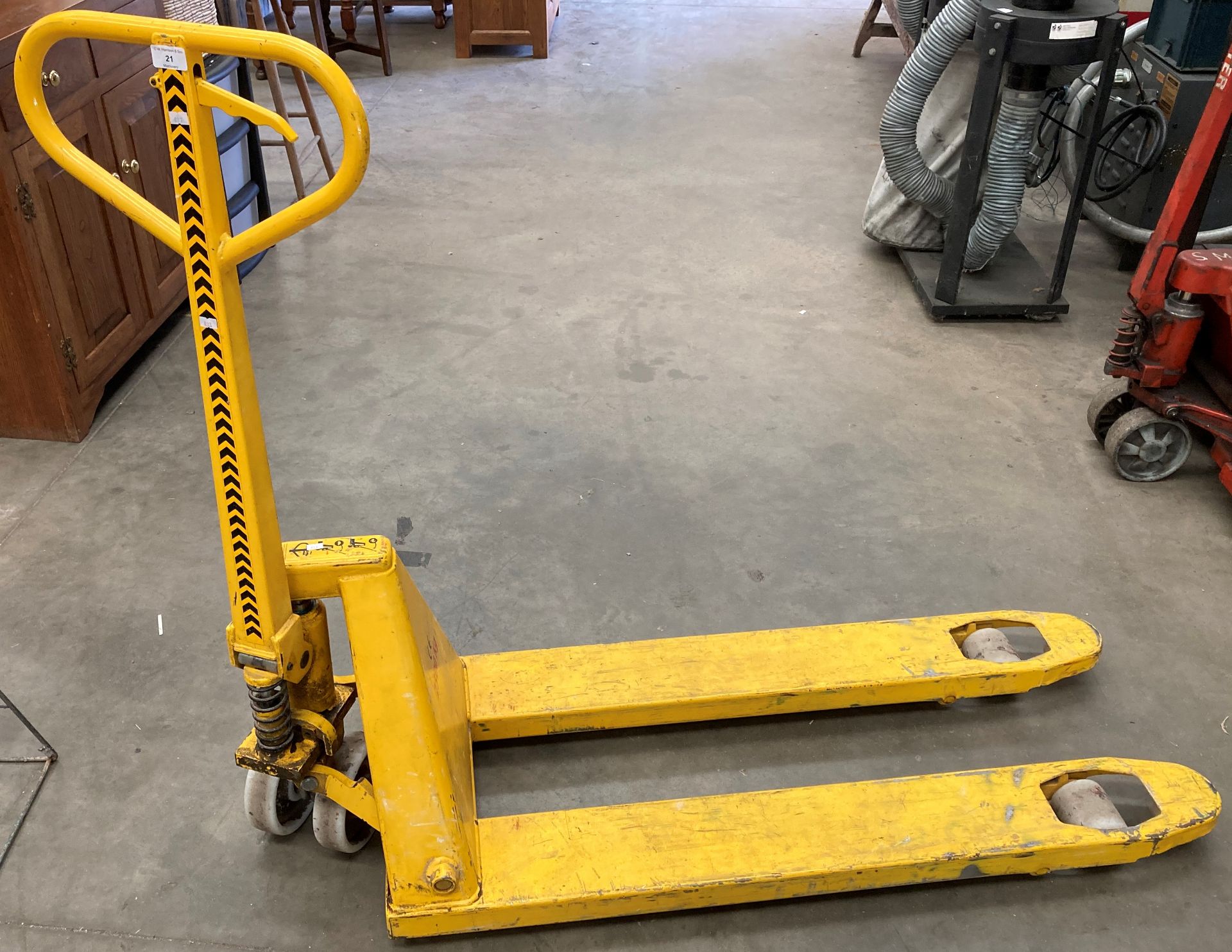 Yellow painted pallet truck 2500kg